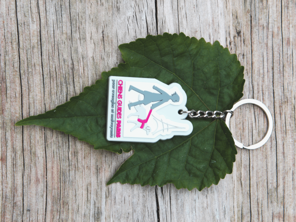 Porte clef caoutchouc avec le logo Chiens Guides de Paris