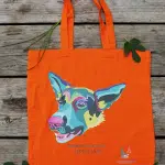 Sac en coton orange avec une illustration de chien coloré