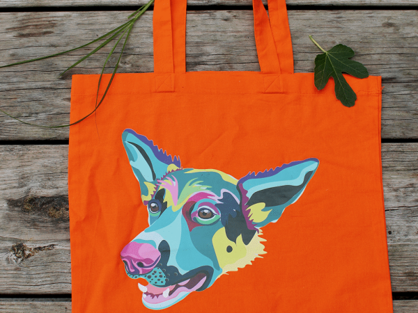 Sac en coton orange avec une illustration de chien coloré