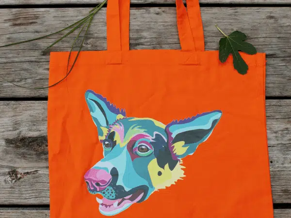Sac en coton orange avec une illustration de chien coloré