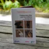 Photo de la couverture du livre. Sur la couverture, quatre encadrés présentent des photos de chiens.